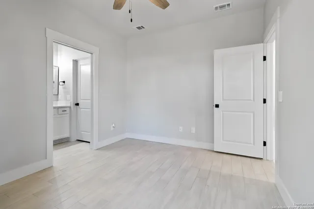 an empty room with windows