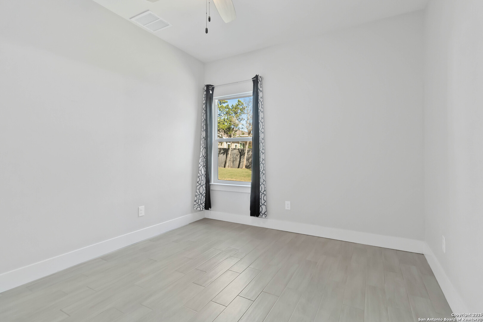 119 Rockingshire Court Spring Branch, TX 78070 - Photo 16 of 34 an empty room with windows