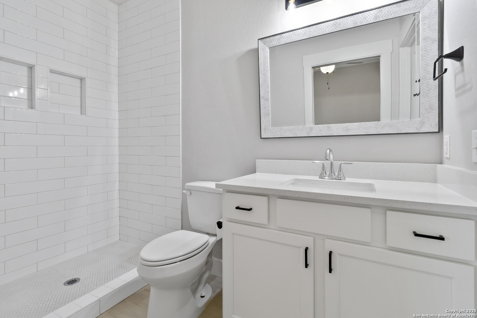 119 Rockingshire Court Spring Branch, TX 78070 - Photo 17 of 34 a bathroom with a sink toilet and shower