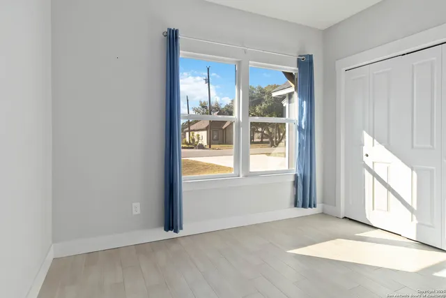 a view of a hallway with entryway