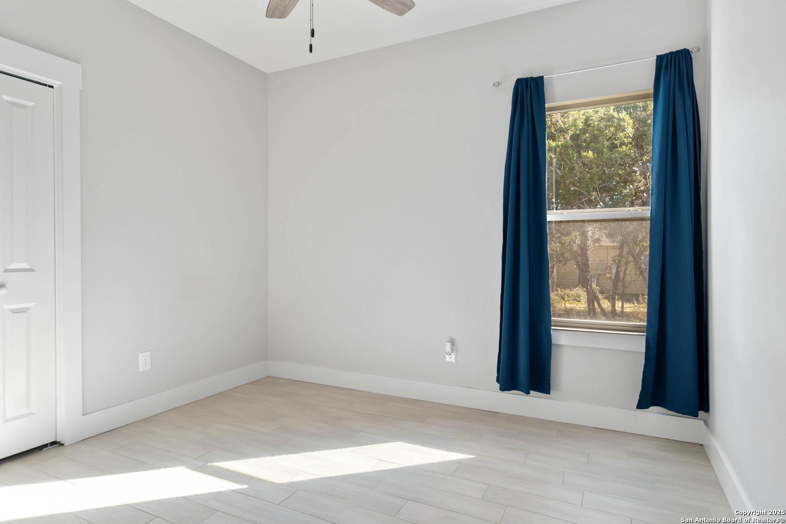 119 Rockingshire Court Spring Branch, TX 78070 - Photo 22 of 34 a view of an empty room with a window