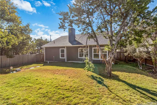 a house view with a garden space