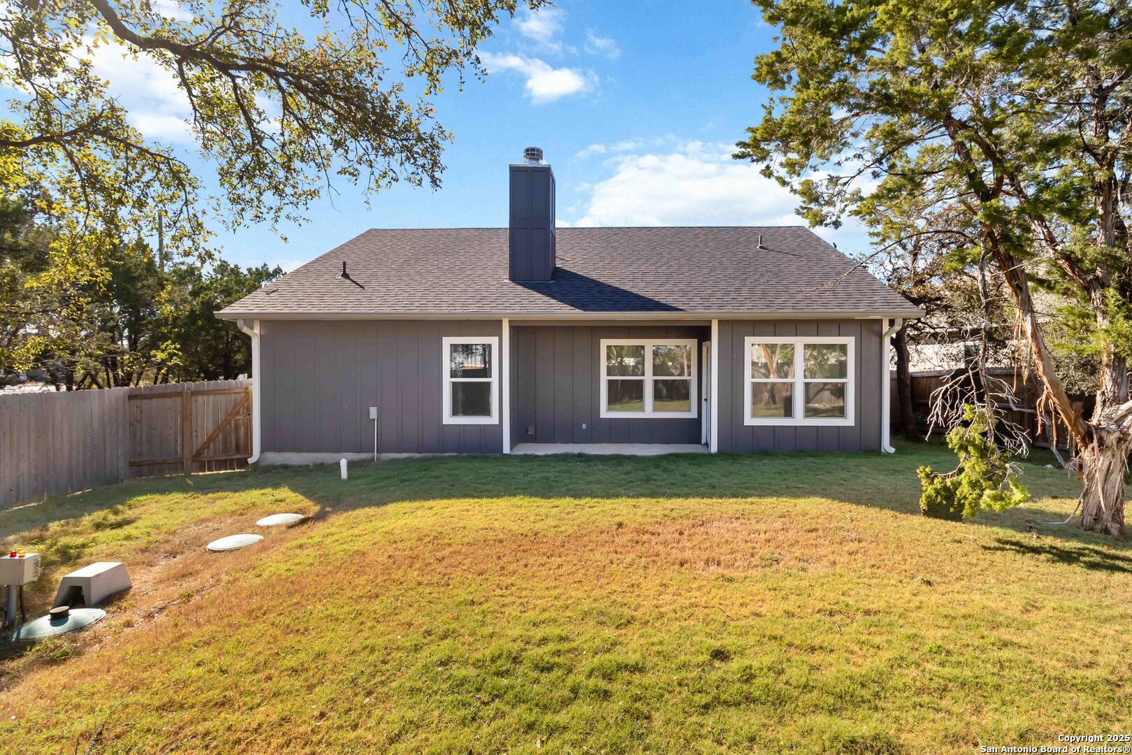 119 Rockingshire Court Spring Branch, TX 78070 - Photo 27 of 34 a house view with a garden space