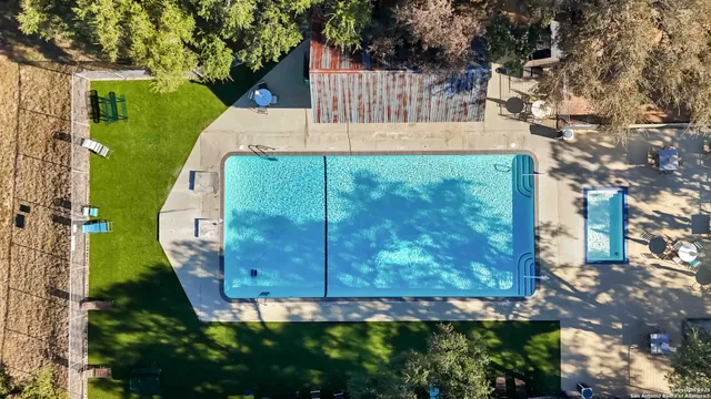 an aerial view of a house with a ocean view