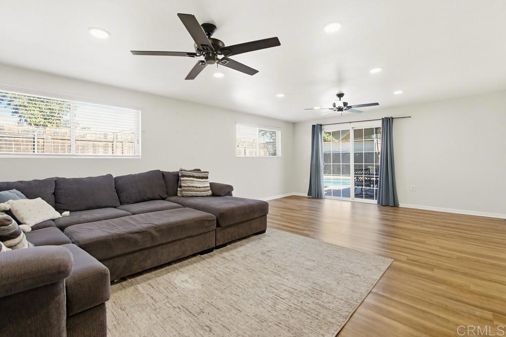 8838 Innsdale Avenue Spring Valley, CA 91977 - Photo 17 of 38 a living room with furniture and a window