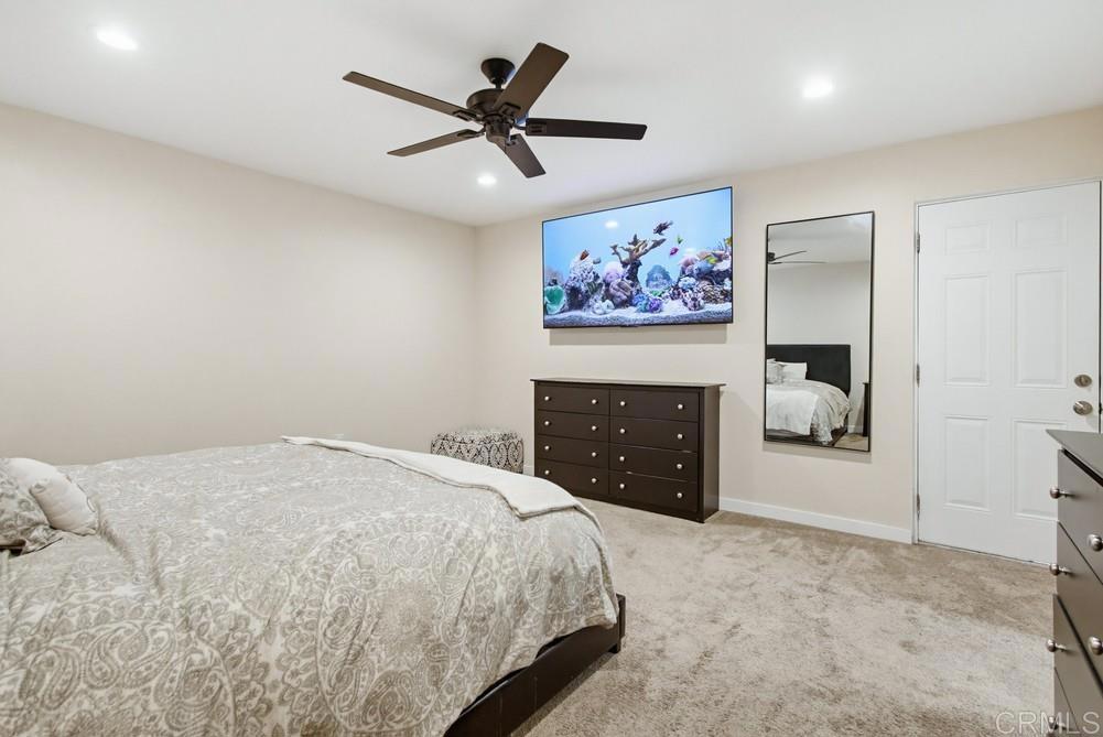 8838 Innsdale Avenue Spring Valley, CA 91977 - Photo 22 of 38 a bed room with a bed and a fireplace