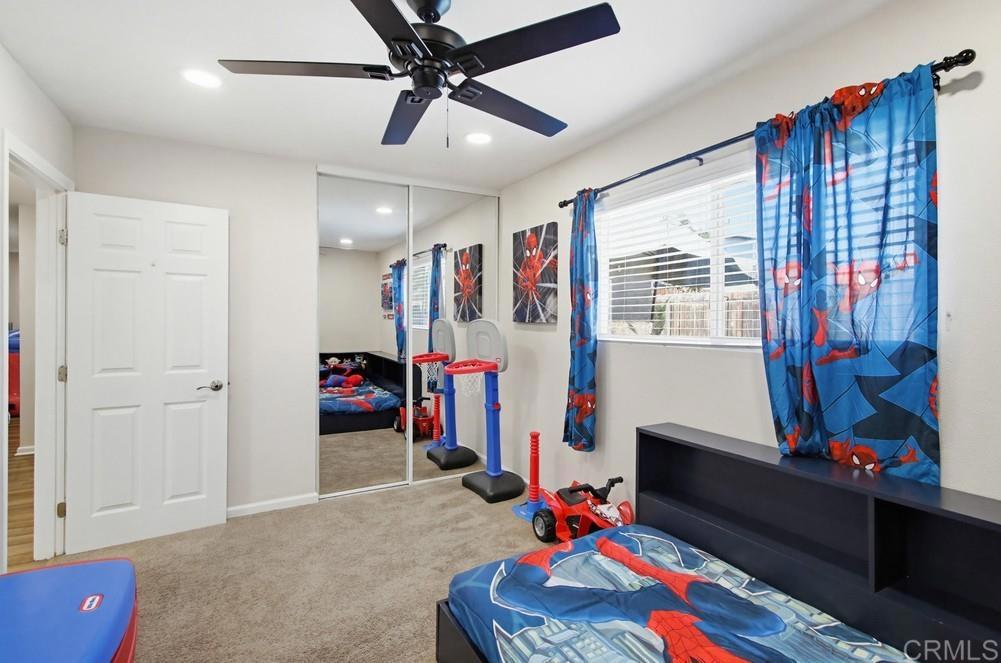 8838 Innsdale Avenue Spring Valley, CA 91977 - Photo 25 of 38 a view of a workspace with furniture and a window