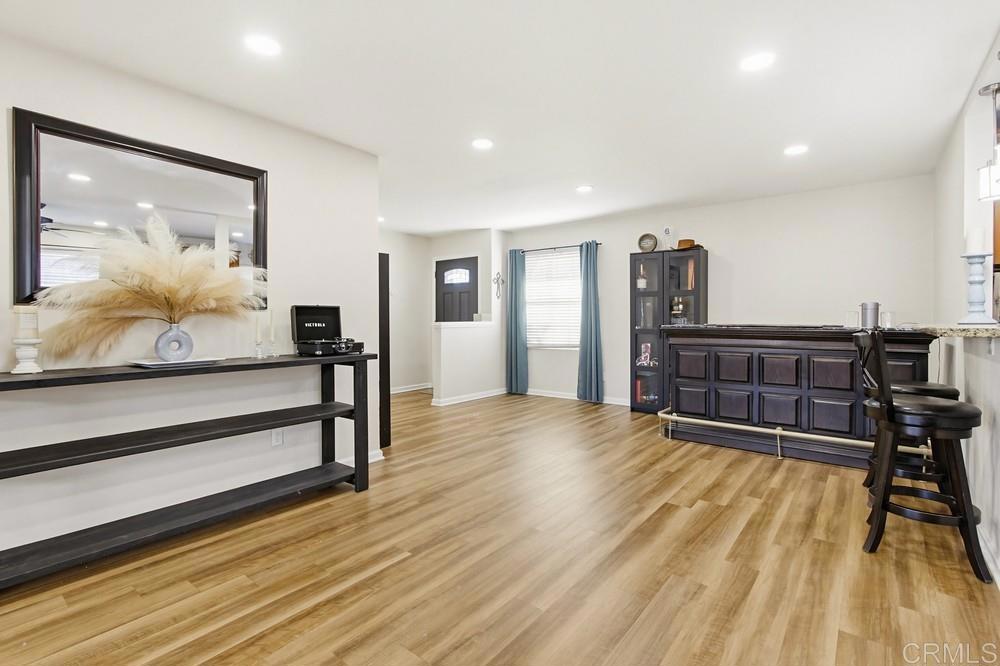 8838 Innsdale Avenue Spring Valley, CA 91977 - Photo 7 of 38 a view of a room with furniture and wooden floor