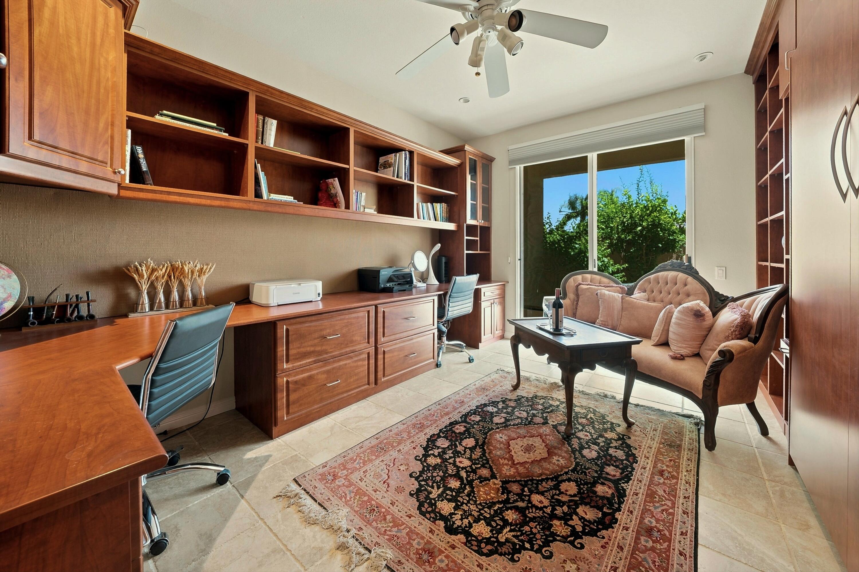 138 Lakeshore Drive Rancho Mirage, CA 92270 - Photo 21 of 30 a living room with furniture a rug and a window