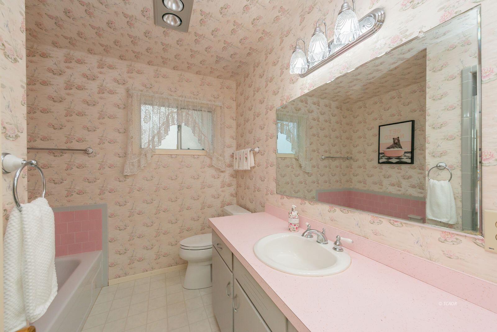 220-230 Lakeview Drive Trinity Center, CA 96091 - Photo 20 of 48 a bathroom with a sink a toilet and mirror