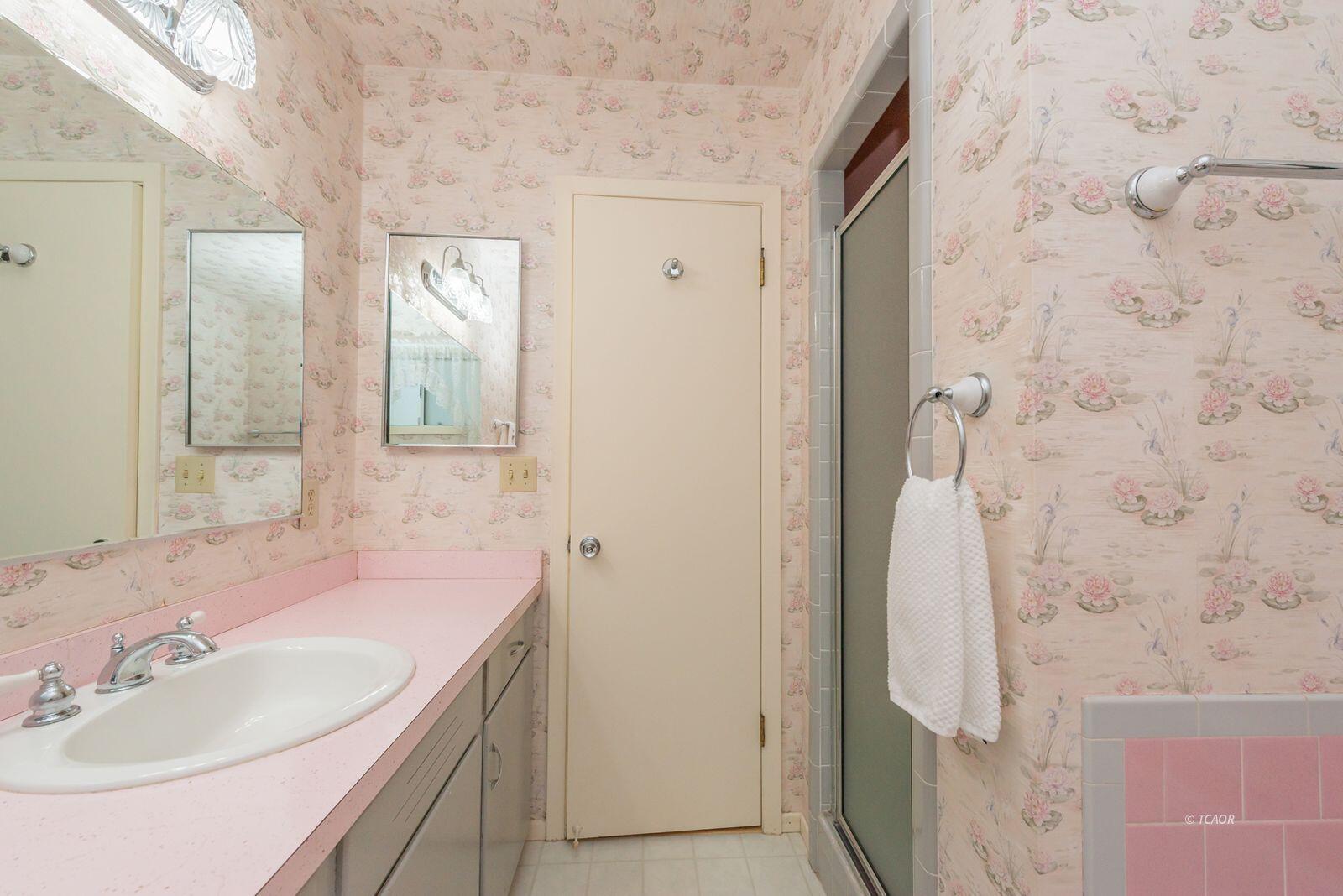 220-230 Lakeview Drive Trinity Center, CA 96091 - Photo 21 of 48 a bathroom with a sink and a mirror