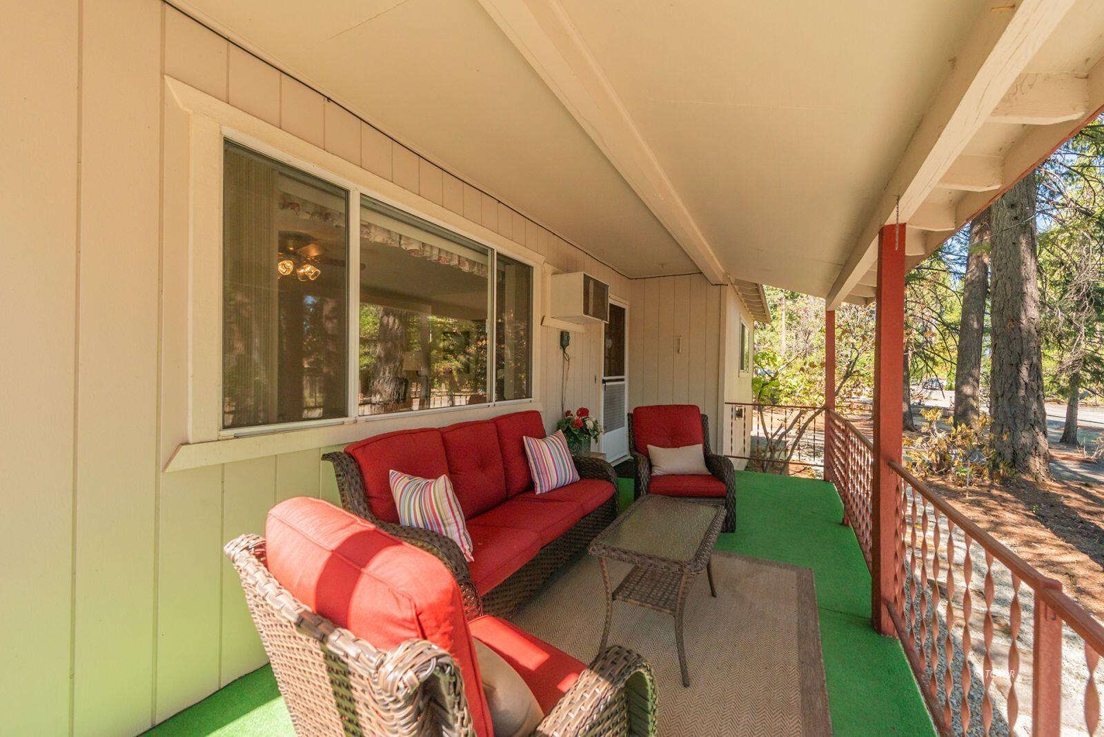 220-230 Lakeview Drive Trinity Center, CA 96091 - Photo 43 of 48 a outdoor living space with patio furniture and wooden floor