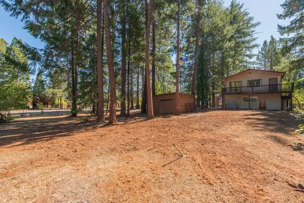 a house with trees in front of it