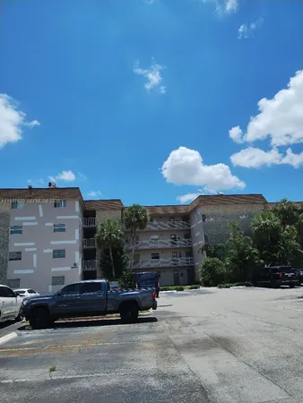 a view of terrace with outdoor seating and city view