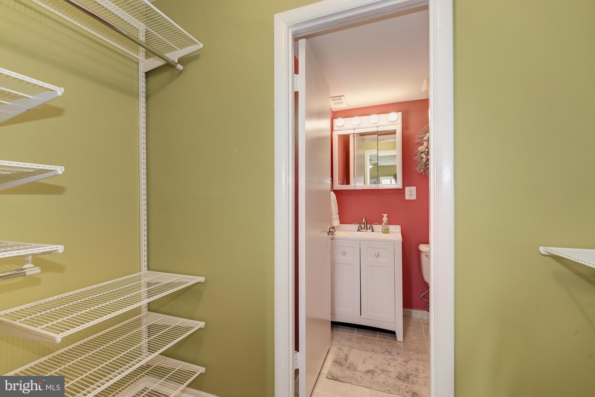 5001 7th Road South, Unit 302 Arlington, VA 22204 - Photo 15 of 30 a view of a bathroom from a hallway