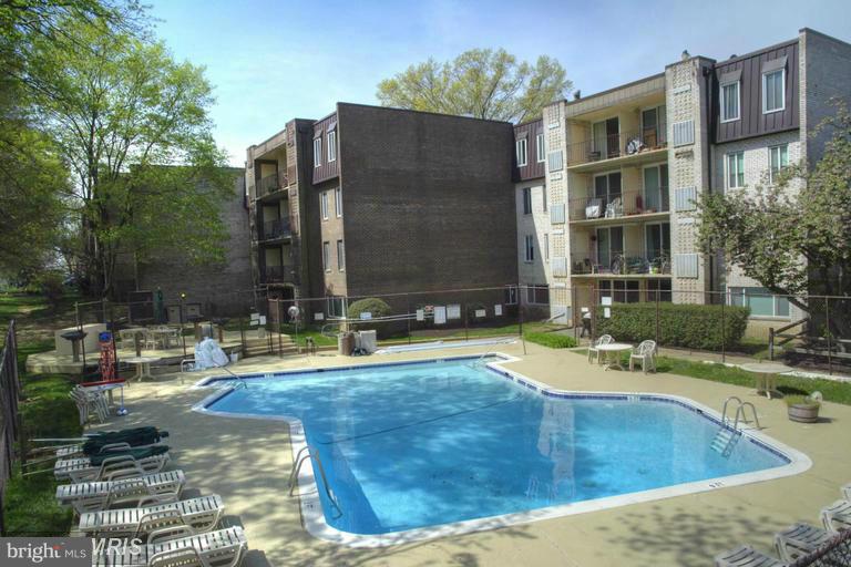 5001 7th Road South, Unit 302 Arlington, VA 22204 - Photo 22 of 30 a view of a house with backyard and sitting area