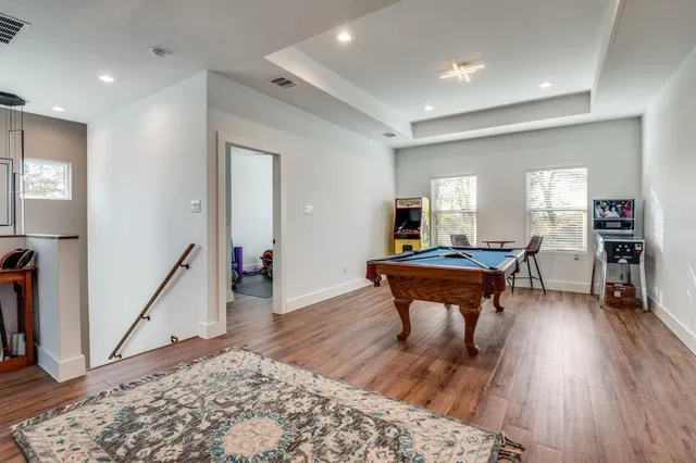 a room with furniture and a wooden floor