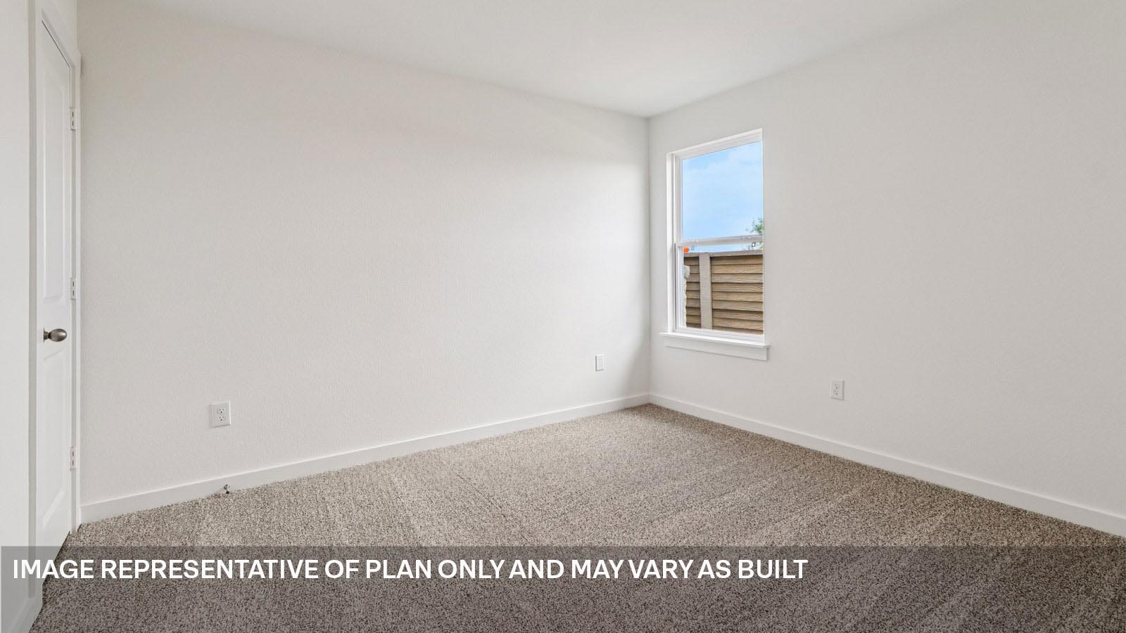 12217 Silverston Tree Bend Buda, TX 78610 - Photo 19 of 24 a view of an empty room with a window