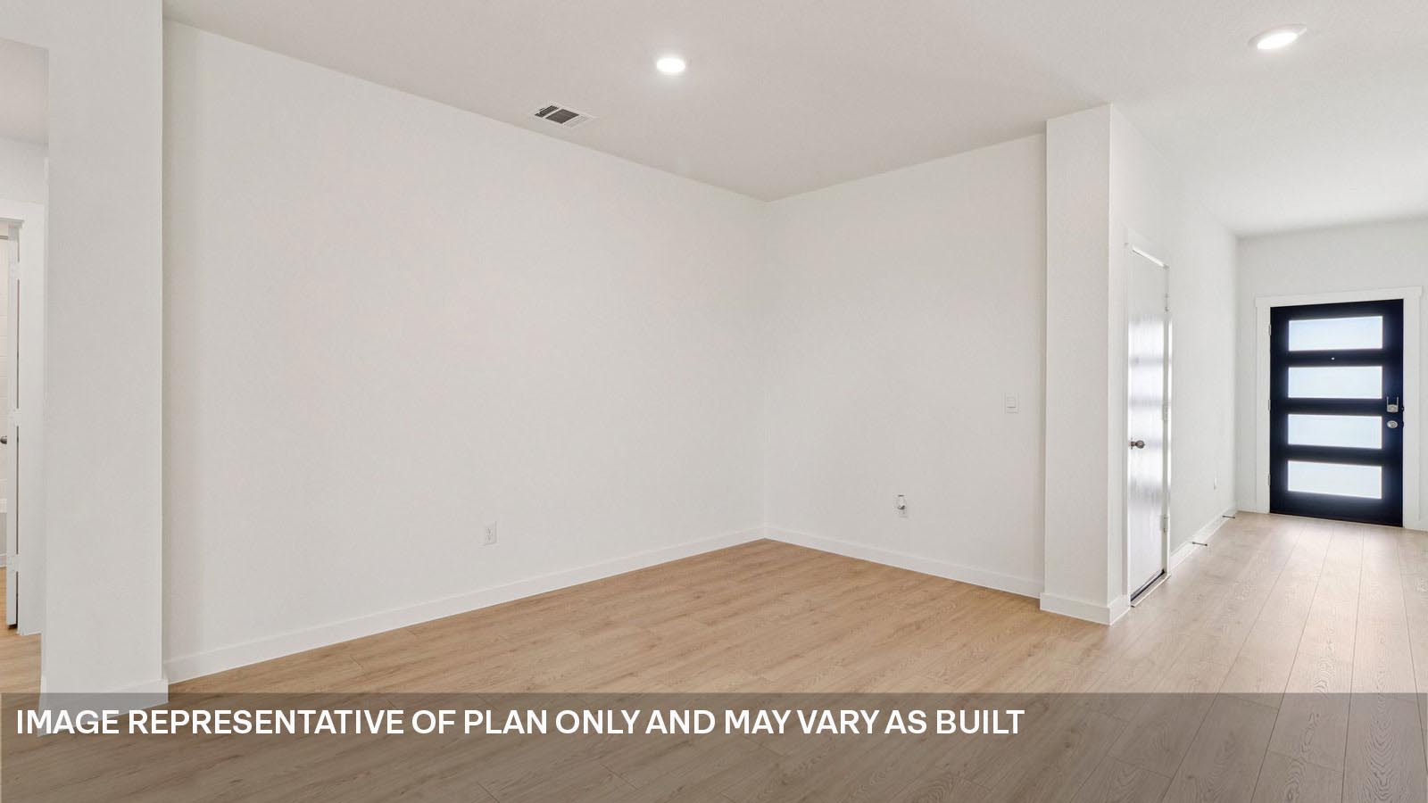 12217 Silverston Tree Bend Buda, TX 78610 - Photo 2 of 24 a view of a room with wooden floor