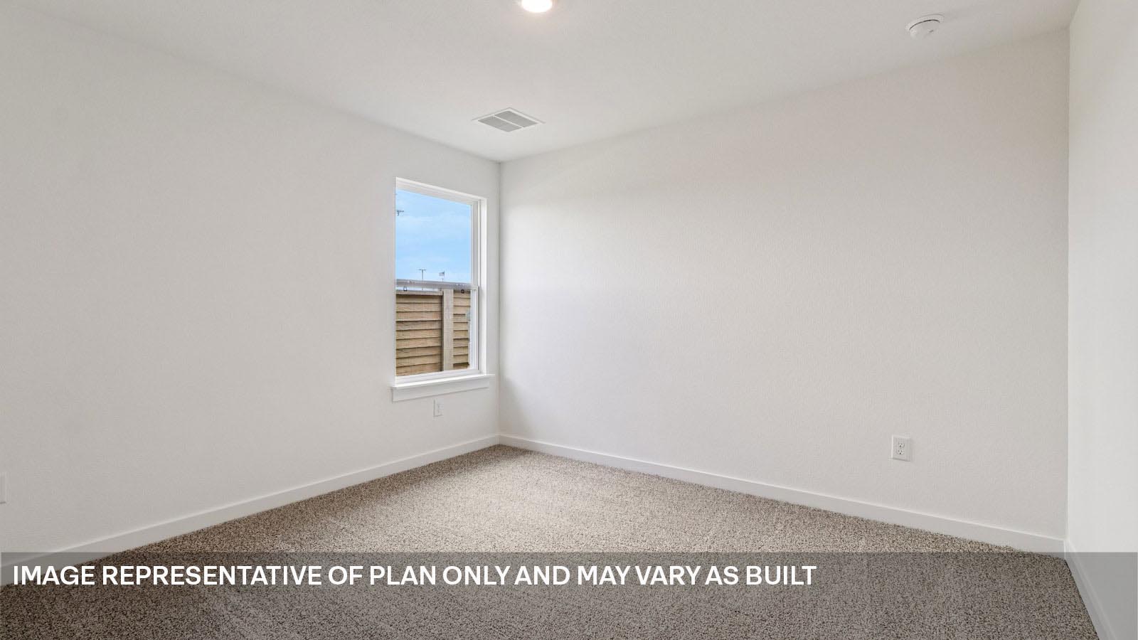 12217 Silverston Tree Bend Buda, TX 78610 - Photo 21 of 24 a view of an empty room with a window