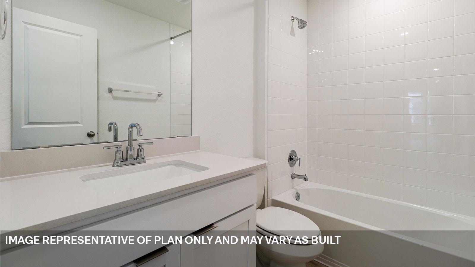 12217 Silverston Tree Bend Buda, TX 78610 - Photo 24 of 24 a bathroom with a sink a toilet and a bathtub