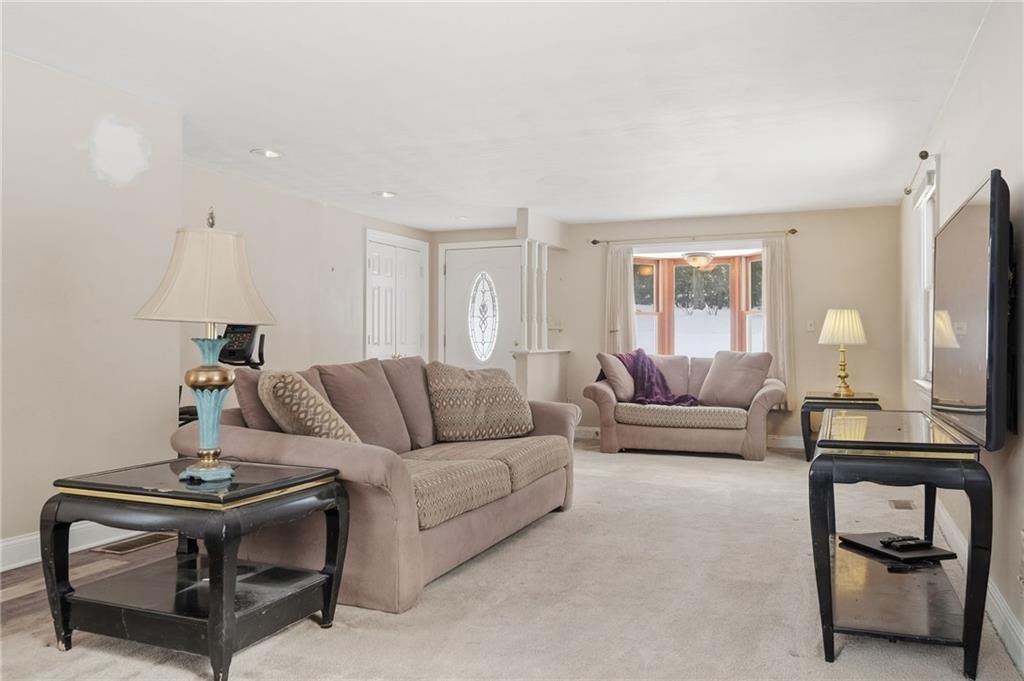 230 Neely School Road Wexford, PA 15090 - Photo 13 of 41 a living room with furniture and a wooden floor