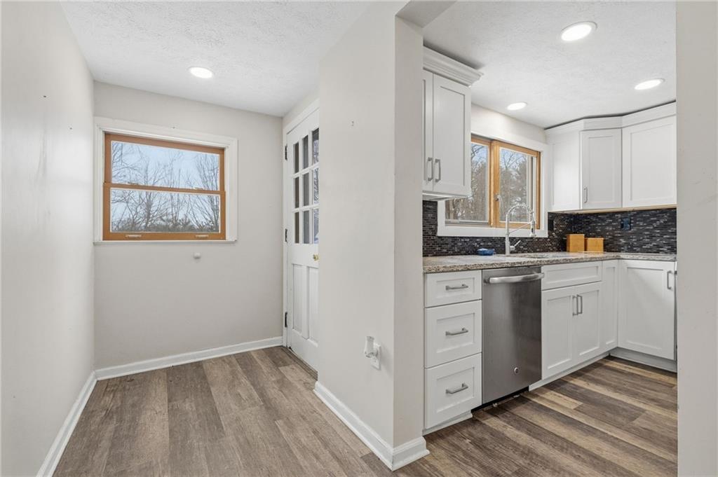 230 Neely School Road Wexford, PA 15090 - Photo 21 of 41 a kitchen with white cabinets and white appliances