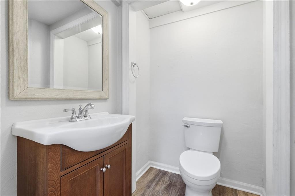 230 Neely School Road Wexford, PA 15090 - Photo 23 of 41 a bathroom with a sink toilet and a mirror