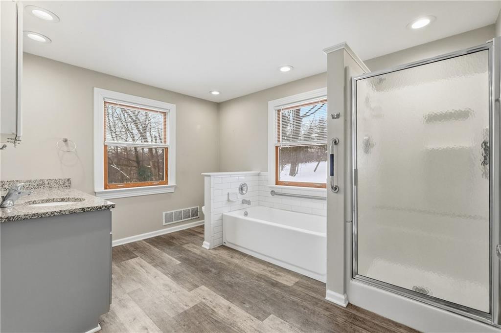 230 Neely School Road Wexford, PA 15090 - Photo 25 of 41 a spacious bathroom with a bathtub and a shower