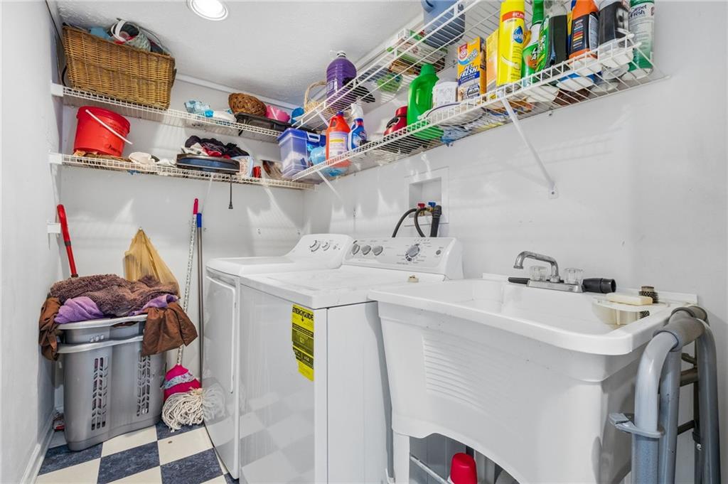 230 Neely School Road Wexford, PA 15090 - Photo 29 of 41 a utility room with sink dryer and washer
