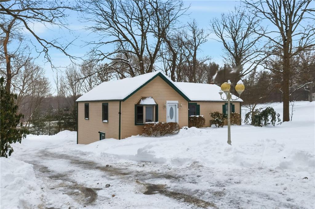 230 Neely School Road Wexford, PA 15090 - Photo 4 of 41 a wooden house covered with snow in front of house