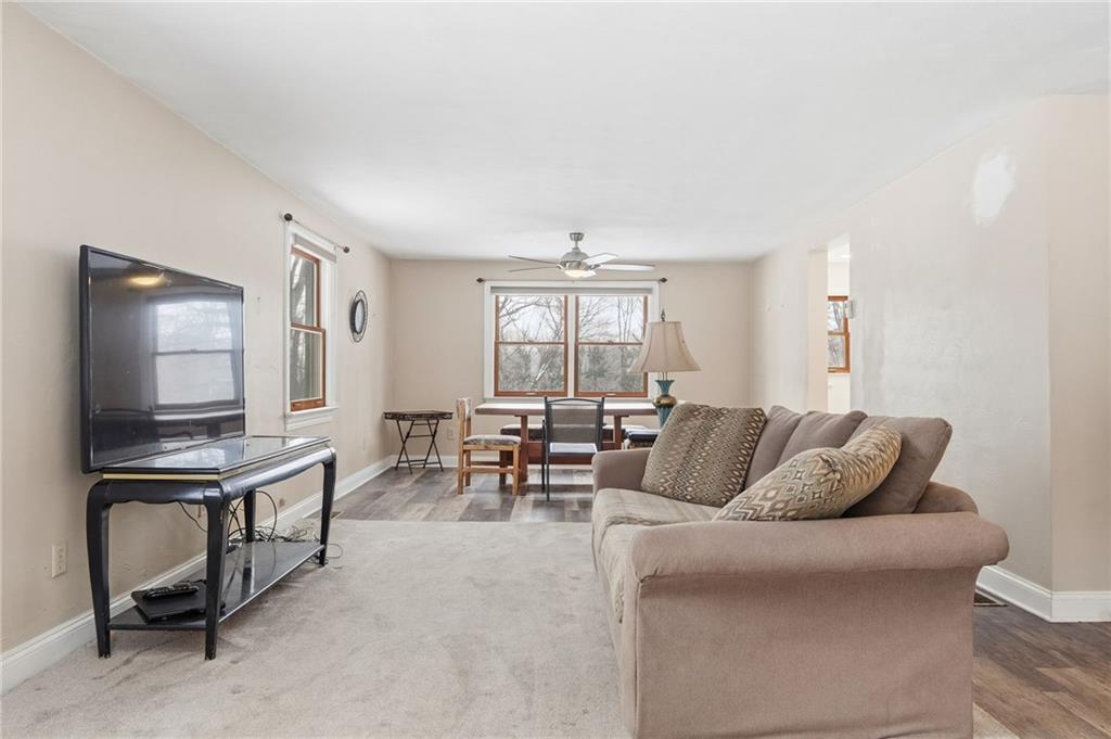 230 Neely School Road Wexford, PA 15090 - Photo 9 of 41 a living room with furniture and a flat screen tv
