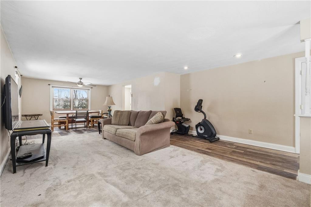 230 Neely School Road Wexford, PA 15090 - Photo 10 of 41 a living room with furniture and a flat screen tv