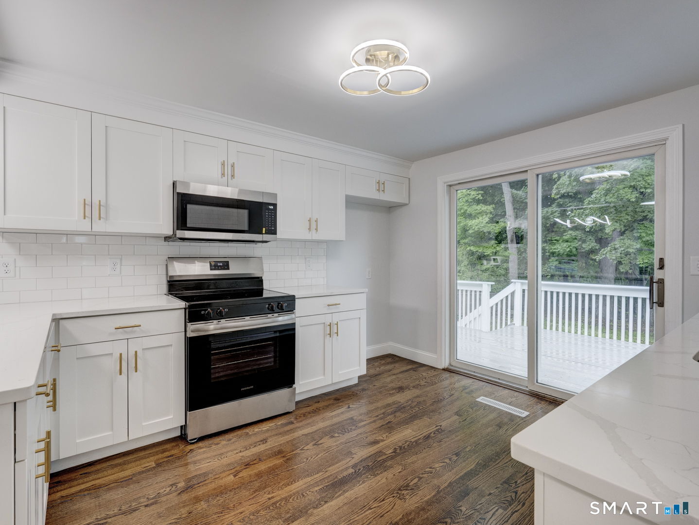 11 Cheshire Road Prospect, CT 06712 - Photo 2 of 38 a kitchen with a stove a sink and a microwave