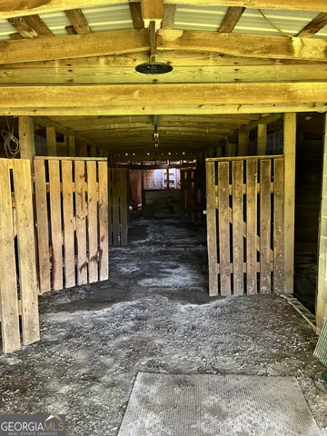 a front view of house with yard and trees