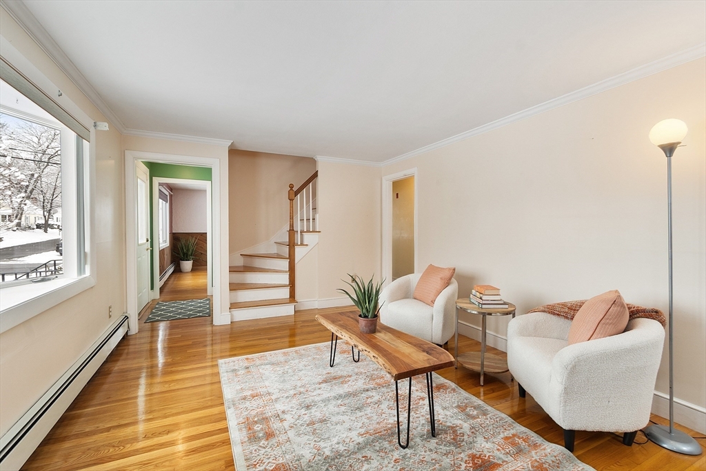 10 Pilling Road Wilmington, MA 01887 - Photo 18 of 41 a living room with furniture and wooden floor
