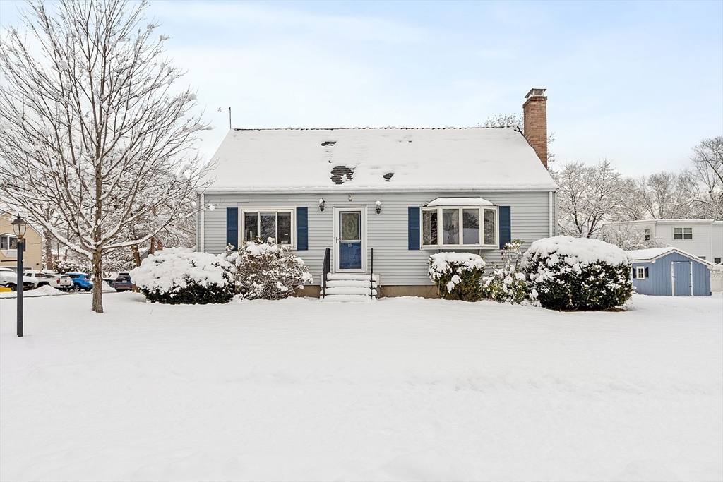 10 Pilling Road Wilmington, MA 01887 - Photo 2 of 41 a view of a house with a yard covered in snow