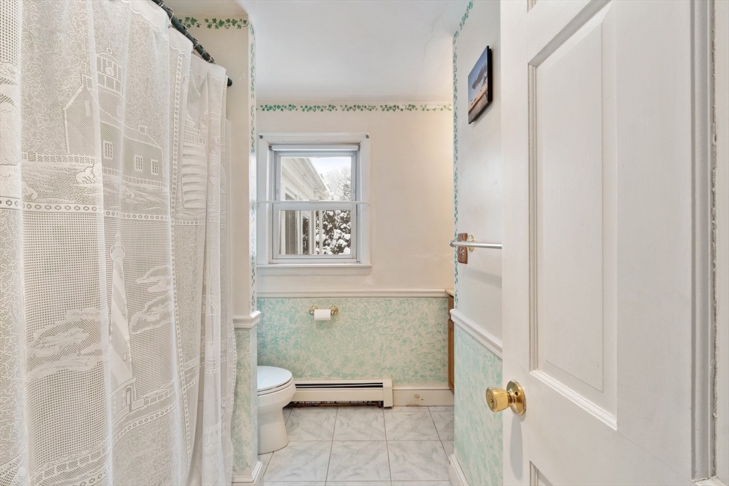 10 Pilling Road Wilmington, MA 01887 - Photo 25 of 41 a bathroom with a toilet and shower