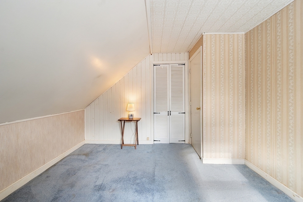 10 Pilling Road Wilmington, MA 01887 - Photo 30 of 41 a view of a room with stairs