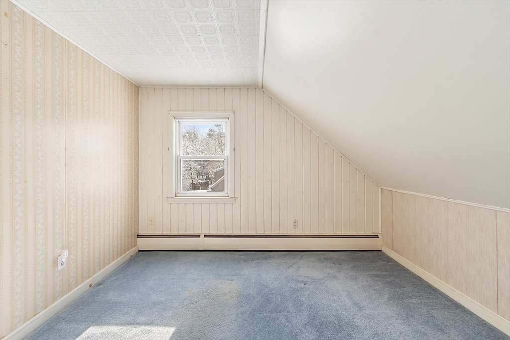 10 Pilling Road Wilmington, MA 01887 - Photo 31 of 41 an empty room with a workbench