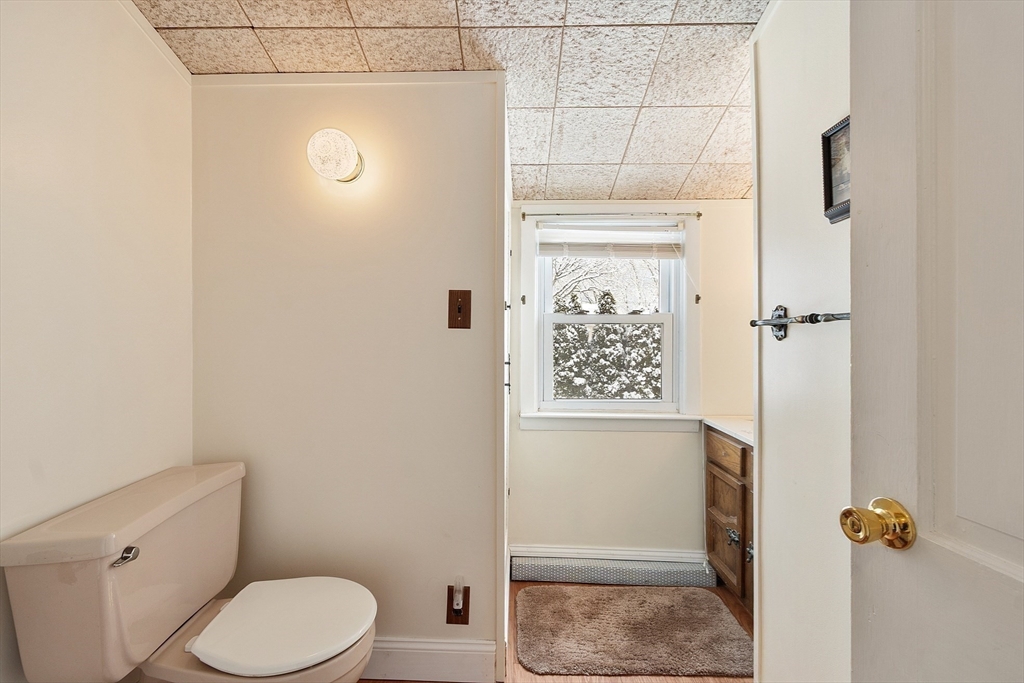 10 Pilling Road Wilmington, MA 01887 - Photo 34 of 41 a bathroom with a toilet and a shower