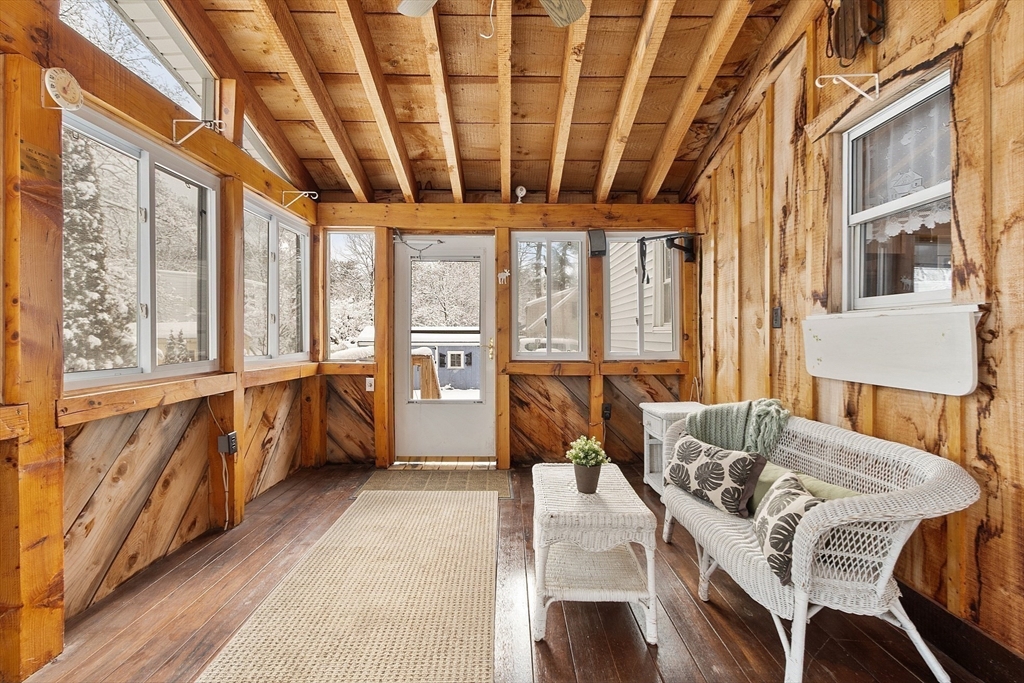 10 Pilling Road Wilmington, MA 01887 - Photo 37 of 41 a living room with furniture and a large window