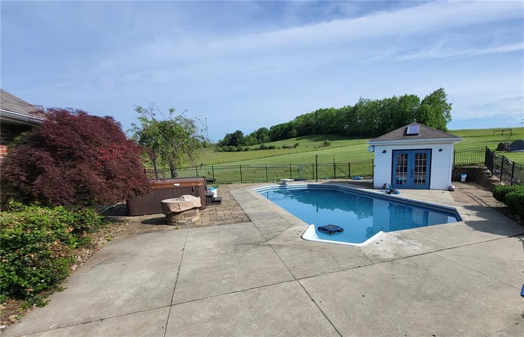 56 Lanik Road Bentleyville, PA 15314 - Photo 4 of 50 a view of a patio with swimming pool table and chairs
