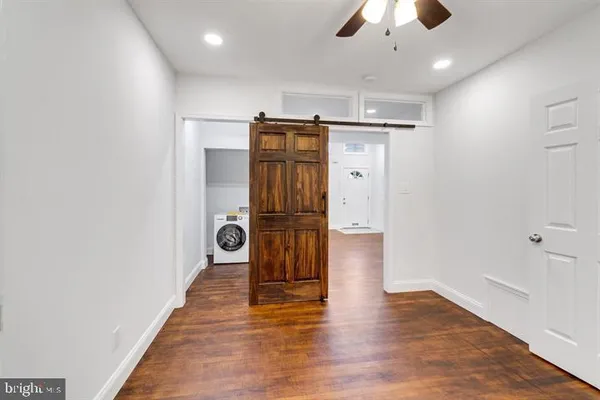 a view of entryway with wooden floor