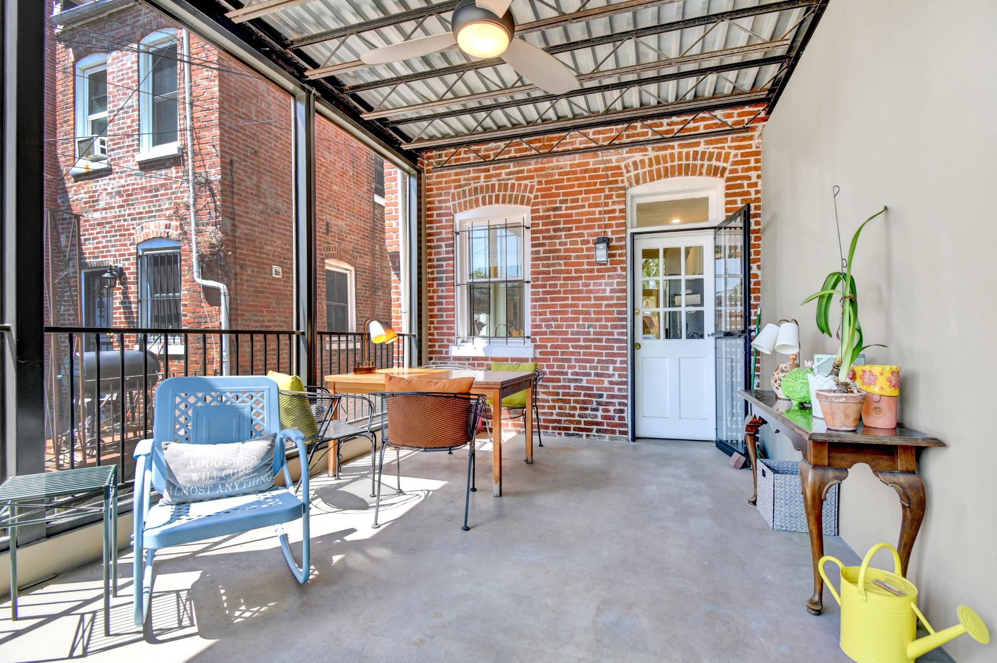 1622 Florida Avenue Northwest Washington, DC 20009 - Photo 14 of 34 a balcony with furniture and a potted plant