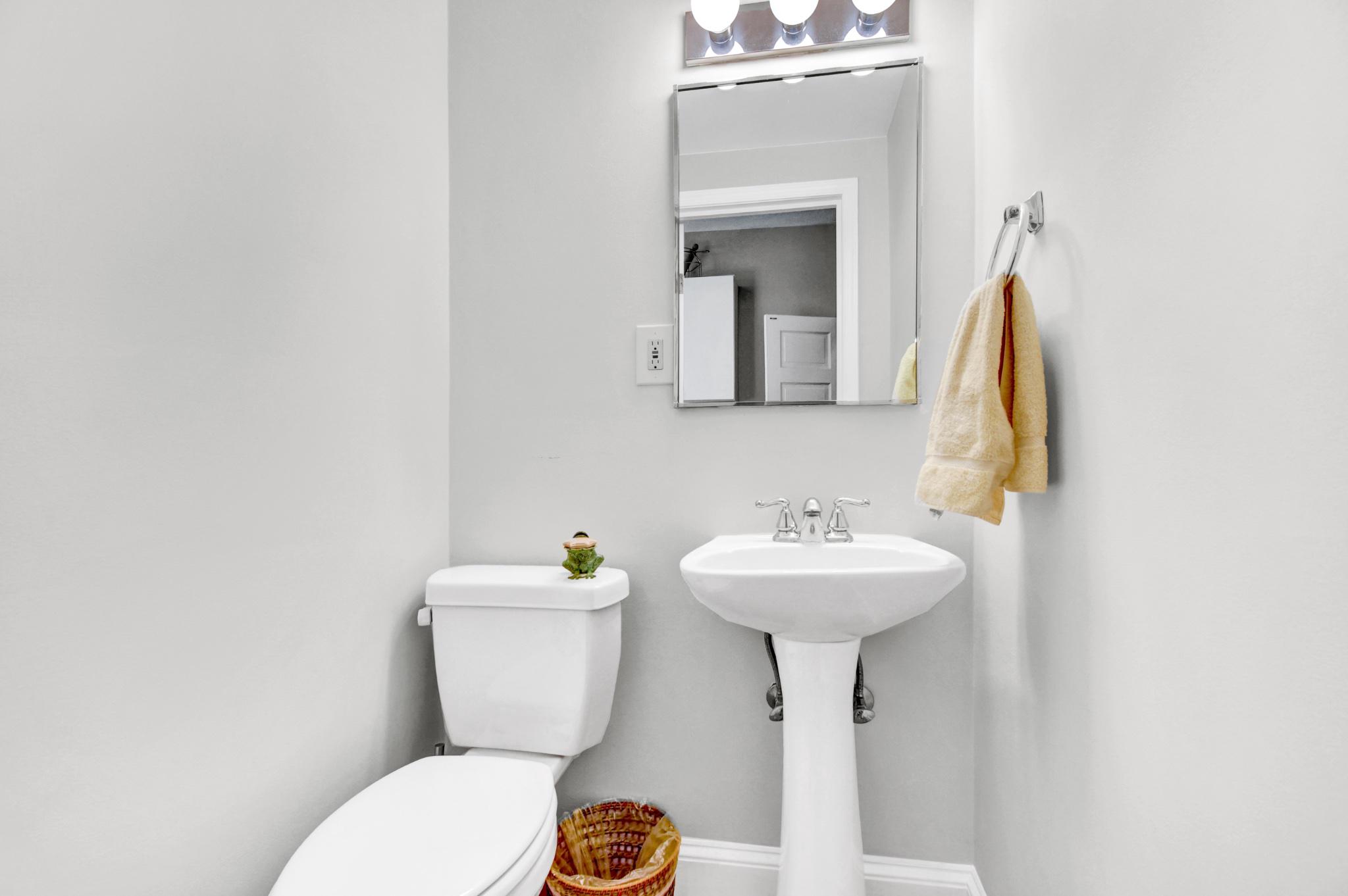 1622 Florida Avenue Northwest Washington, DC 20009 - Photo 15 of 34 a bathroom with a sink mirror and toilet