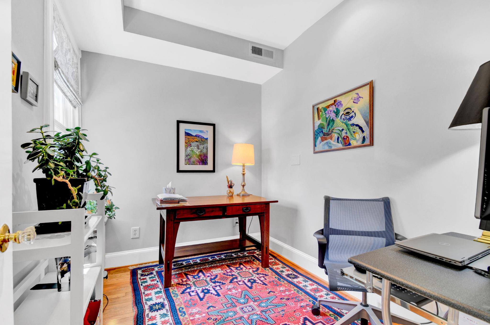 1622 Florida Avenue Northwest Washington, DC 20009 - Photo 24 of 34 a living room with furniture and a flat screen tv