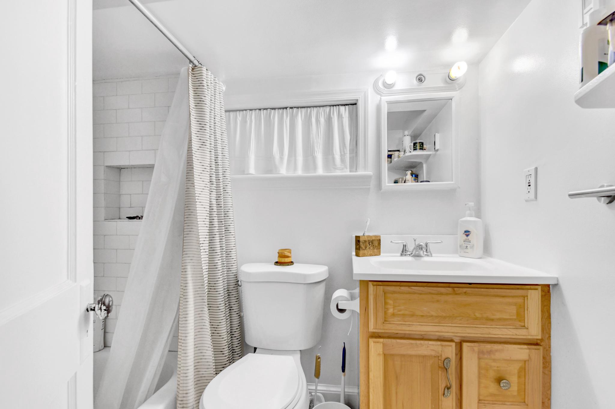 1622 Florida Avenue Northwest Washington, DC 20009 - Photo 30 of 34 a bathroom with a sink toilet and vanity