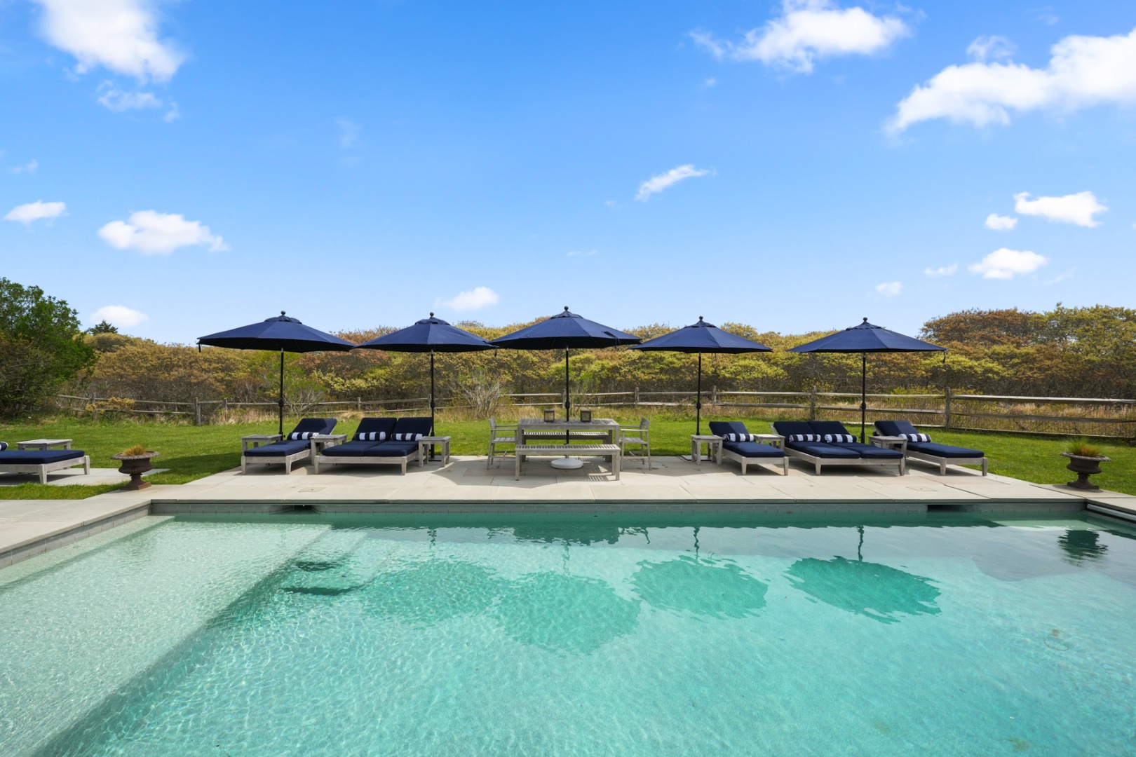 21 Quidnet Road Nantucket, MA 02554 - Photo 60 of 62 a view of a yard with swimming pool and seating area