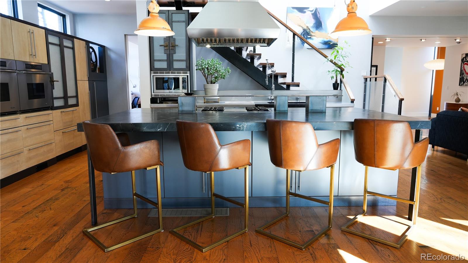 421 Dexter Street Denver, CO 80220 - Photo 8 of 36 a dining room with furniture and wooden floor